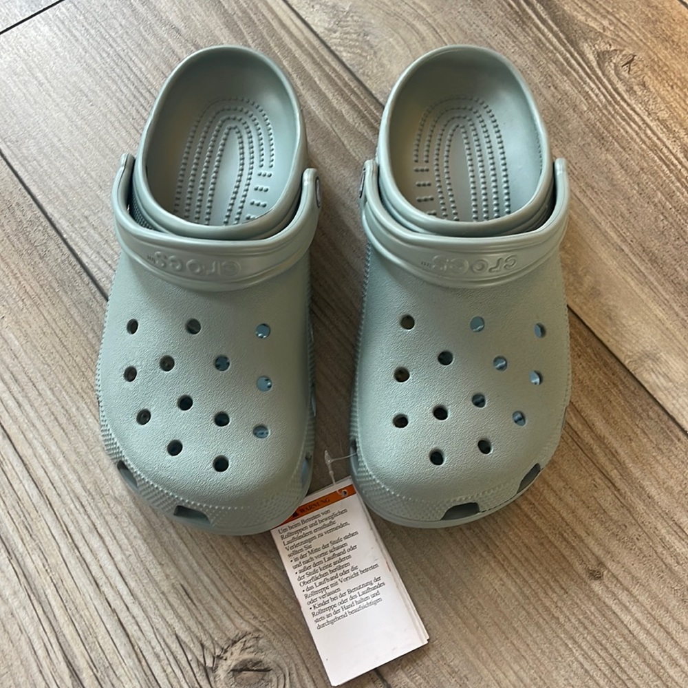 Grey Crocs. Woman’s size 10
